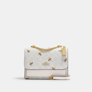 Coach Outlet Klare Crossbody In Signature Canvas With Bee Print