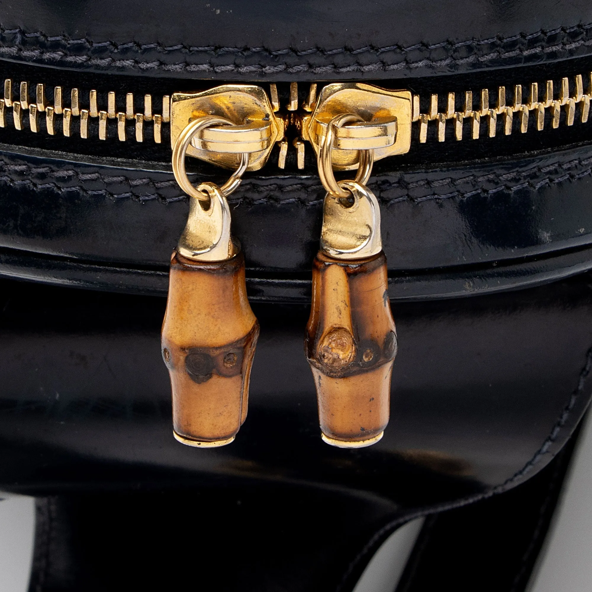 Gucci Vintage Patent Leather Bamboo Sling Backpack (SHF-dSK8BK)