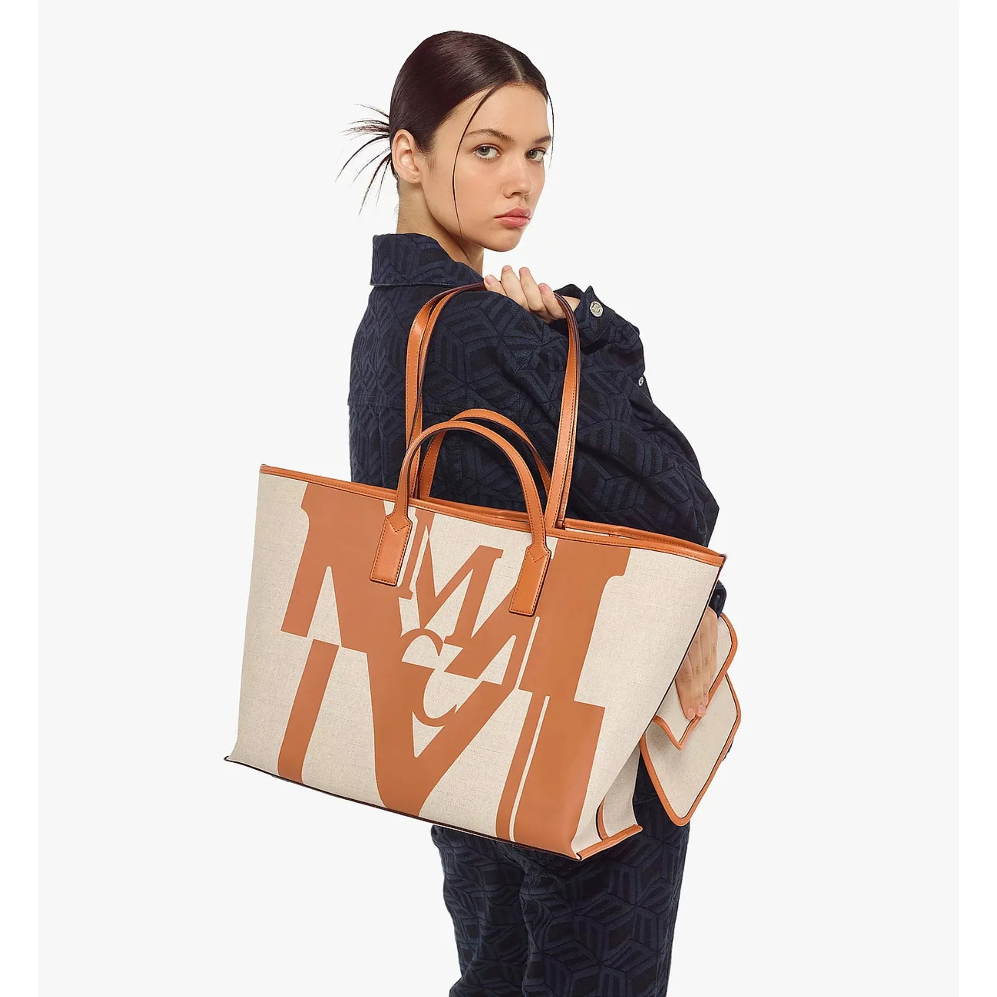MCM pushes the architectural logo to its limit, causing a deep glitch in the classic