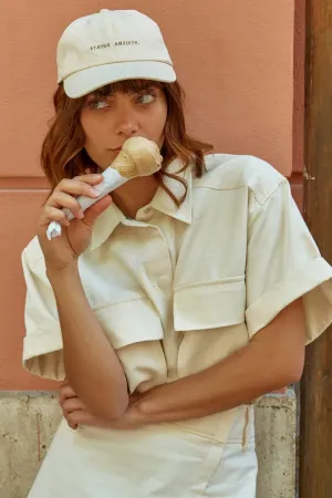 Status Anxiety Under The Sun Cap Cream